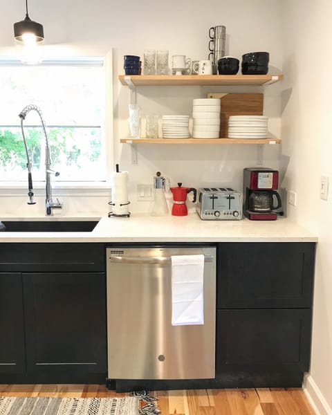 Kitchen with brand new appliances and quartz counters