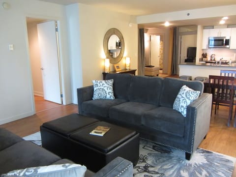 Living area toward kitchen and bedrooms