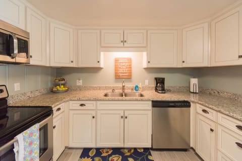 View leading into living room, from kitchen dining. 
