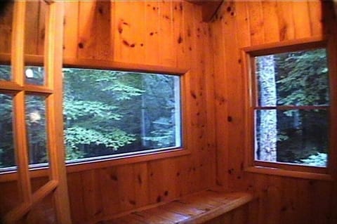 Front entrance porch with bench seating (partial view)