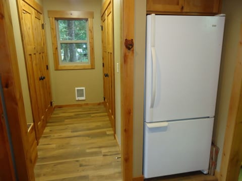 Laundry area and extra fridge