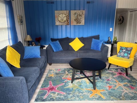 Serene living room & open concept to dining room, colorful & happy-!