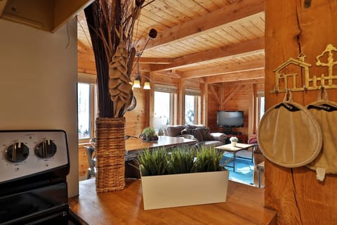 Share a meal outside at the deck table, surrounded by leafy woods and a glimpse of the hills.