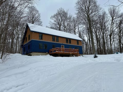 Winter exterior view of The Cabin at Killington, our vacation rental home in Killington, Vermont.