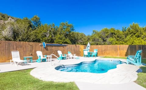 Private Pool with Seating in Pool and Deck Furniture