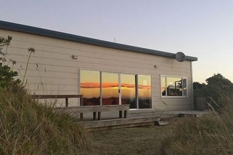 Sun setting on the beach house