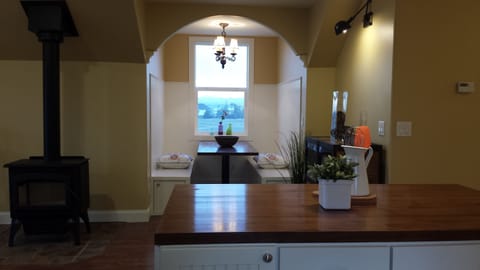 Dining dormer and wood stove.