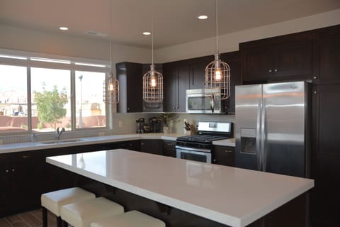 Delux kitchen with pebble ice maker, gas range & walkout outdoor dining area.