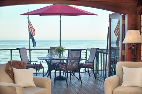 Dine al fresco to the tune of waves crashing below!