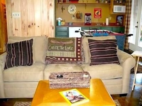 Sofa in game room - large screen TV to watch the game! Wet bar with mini refrig.