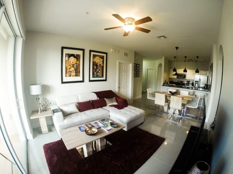 Cozy Living and dinning room. Authentic prints of the artist Luciano Martins