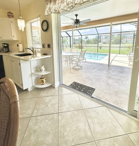 Patio doors are pocket and fully open to the pool and lanai