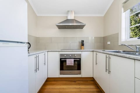 Kitchen, adjacent to dining room.