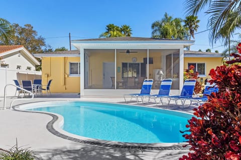 Screened Lanai overlooking saltwater pool 