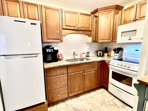 Kitchen has all essentials.  No dishwasher...but who's going to cook with all of the fabulous restaurants on the island?