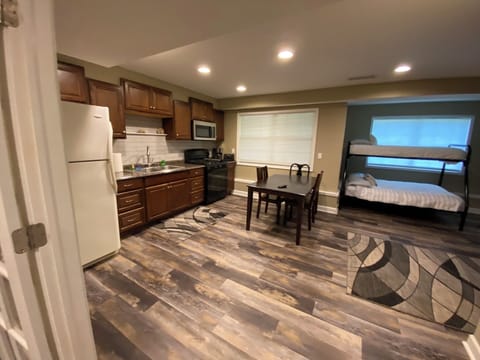Full second kitchen in the basement - with  double/twin bunk and 55" LED TV