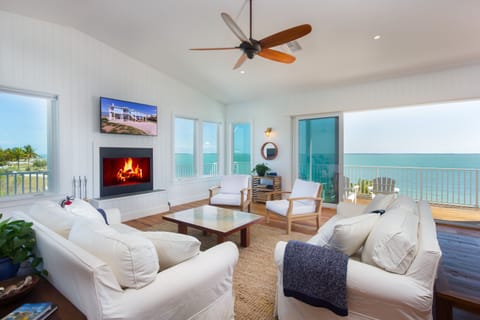 The Blue Marlin's living room offers panoramic views and two comfy couches.