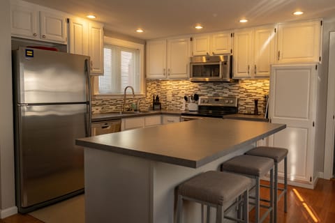 Completely updated kitchen; island has electricity for easy working from home