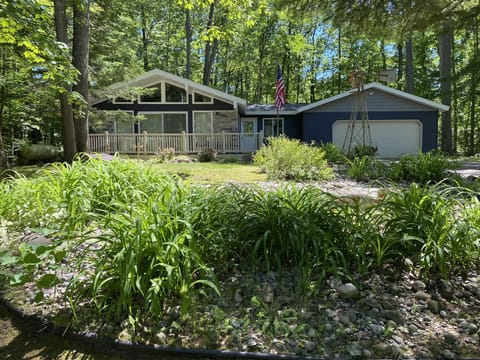View from front of cottage. Cannot see the large yard or woods on both sides.
