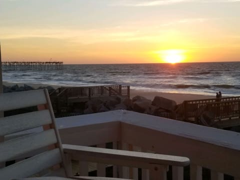 Welcome to your sunrise at The Pink Sunskipper, right on top of the beach