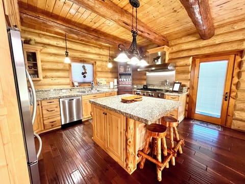 Granite countertops throughout kitchen.