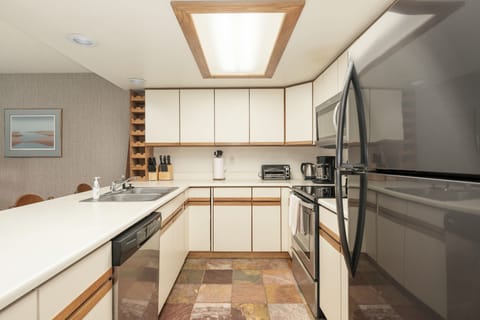 Stainless steel appliances & slate tile