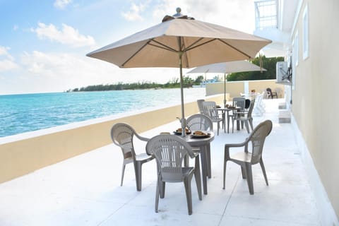 Bask on our patio at Waterfront Haven! Eat, Lounge, Fish!