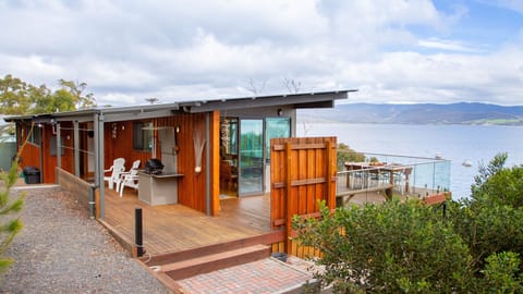 Large windows and wide verandas maximise the views