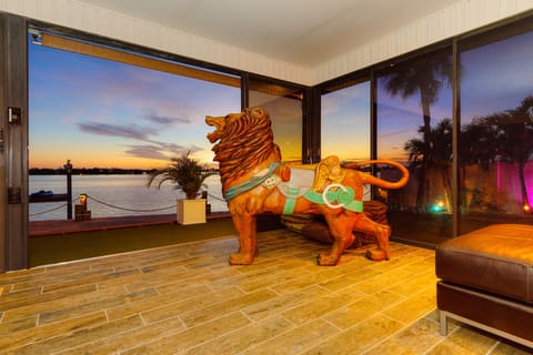 Antique carousel lion stands guard, adding charm and history to your stay.