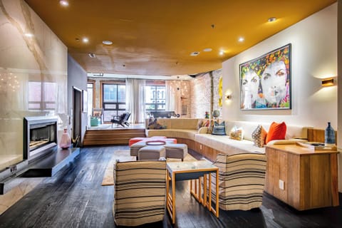 Urban Loft Featuring Stylish Fireplace