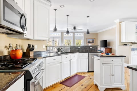 Enjoy cooking and dining in this  open-concept kitchen, perfect for creating lasting memories.