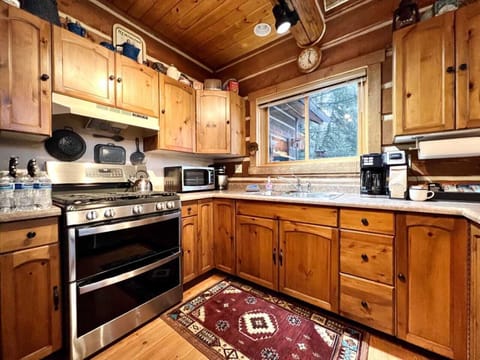 Kitchen with bar and new appliances