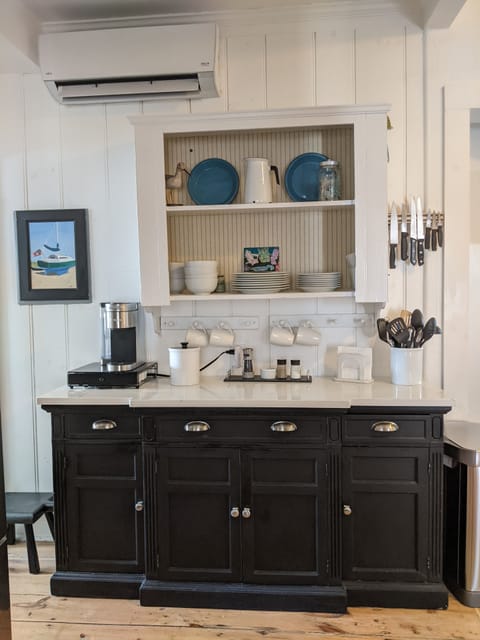 Kitchen has recently been updated with quartz counters and stainless appliances.