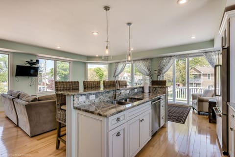 Custom kitchen with Viking appliances, unique granite, and huge island!