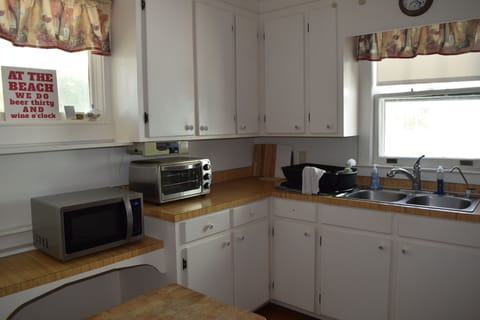 Kitchen area with microwave and toaster oven