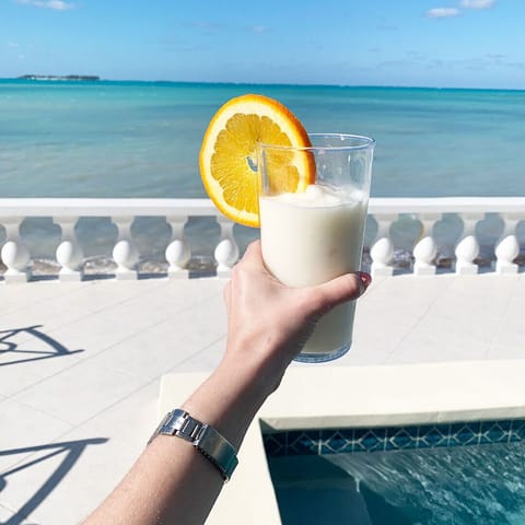 Enjoy frozen drinks and ocean views on the veranda 