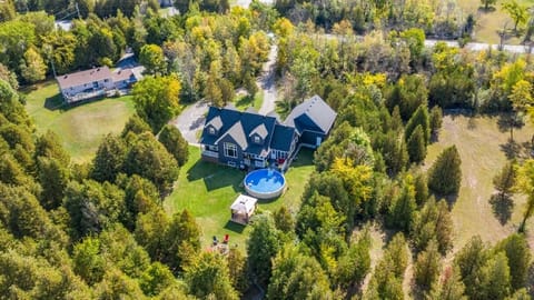 We own the large green space to right of the house which is great for sports. 