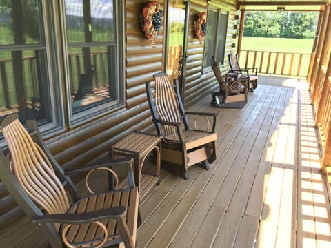 large wrap around porch with very comfortable glider rockers