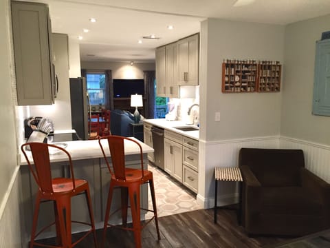 Flow through kitchen with a bar area for entertaining.  