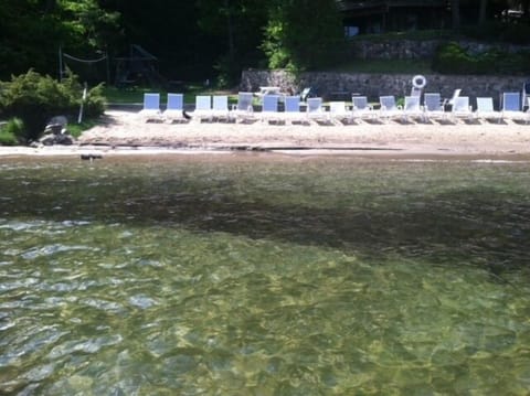 Association beach. There is a float and plenty of chairs. Also, swing area/kids.