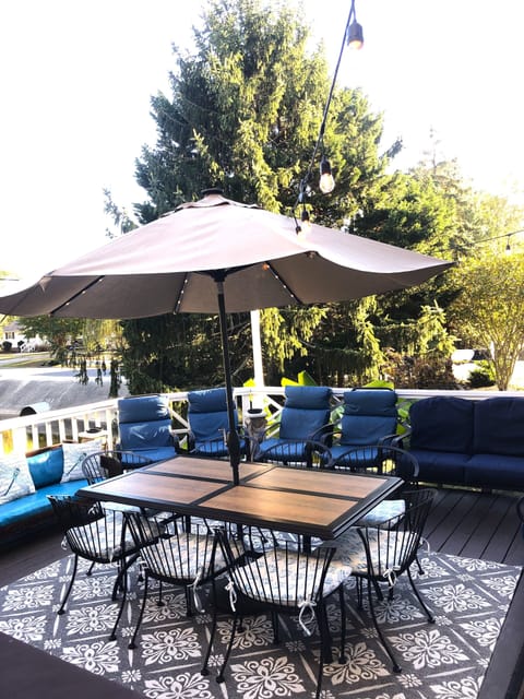 Deck-8 Person jacuzi, Cushy Seating, Accent Lights & Umbrella, Overlooking pond.