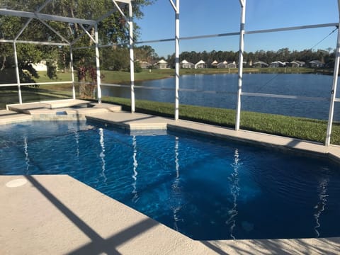 Relax and enjoy the lake from the pool or spa. 