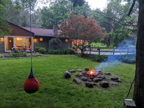 Fireplace, deck and swing. 