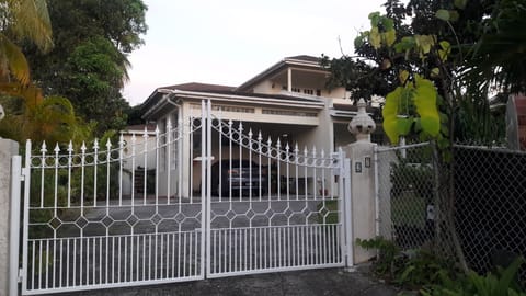 Property Entrance - Wrought Iron gate with House Number "27" on right pillar