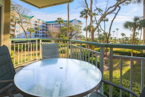 The covered balcony overlooks the Windsor II garden and has limited ocean views.