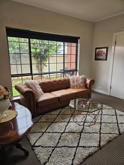 main bedroom  with couch in it.