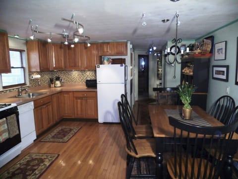 Kitchen and Dining Area. Fully stocked with everything needed to prepare a meal.