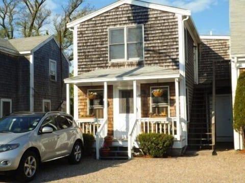 Street view of condo front and the one car parking space.