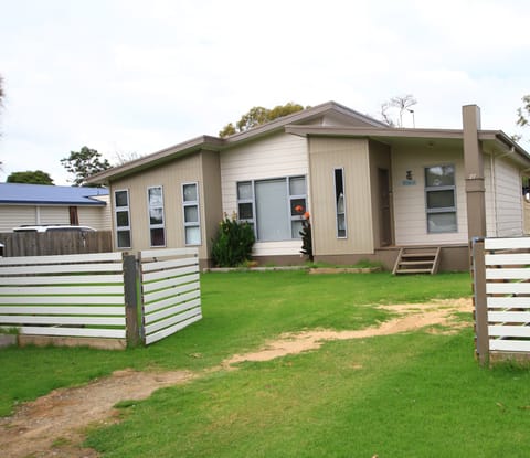 Front yard full enclosed great for children to play or secure you pet.