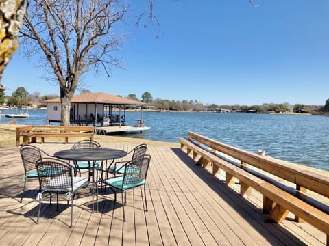Huge walk out deck at eye level view of open lake!